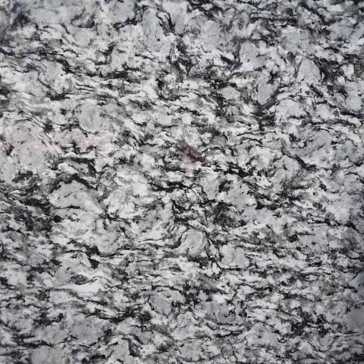 Spray White granite surface for material selection for countertop material selection