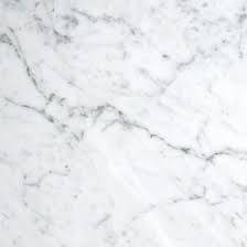 White Carrara marble surface for material selection for countertop material selection