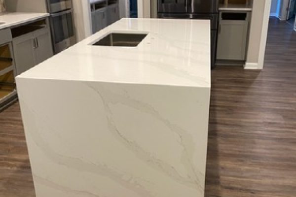 calacatta-cal-gold-quartz-waterfall-kitchen-island-craftsmanship-durability